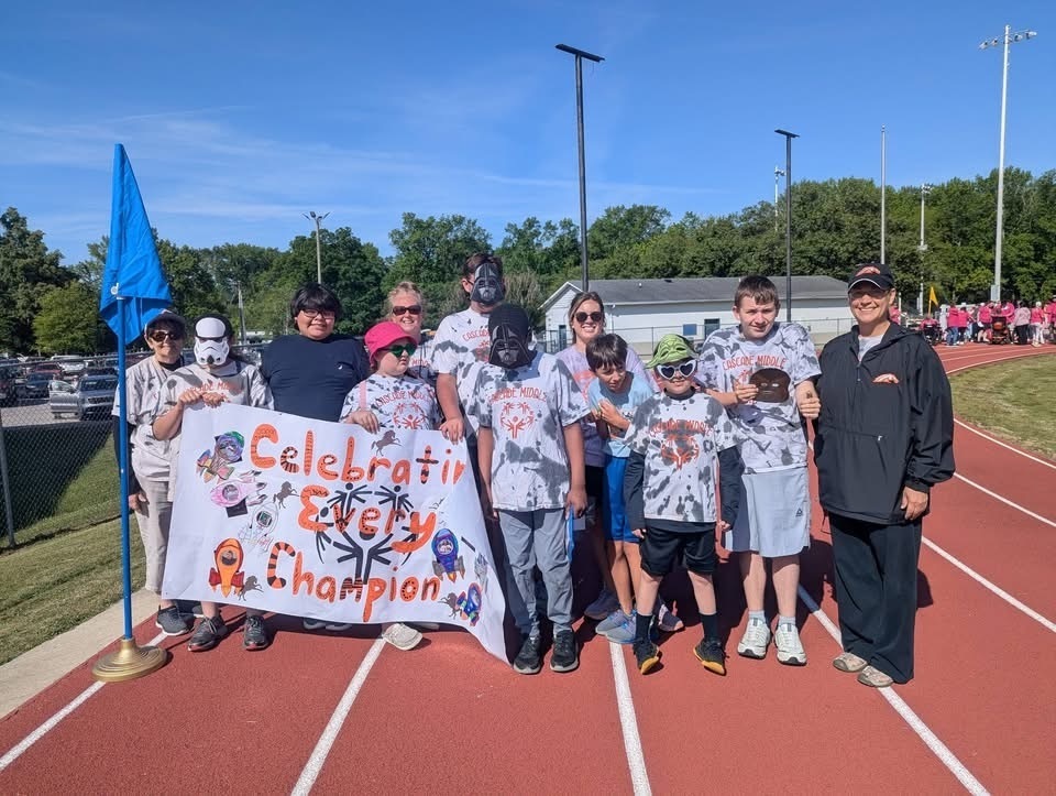 Cascade Middle School students pose for a group picture at the Special Olympics.