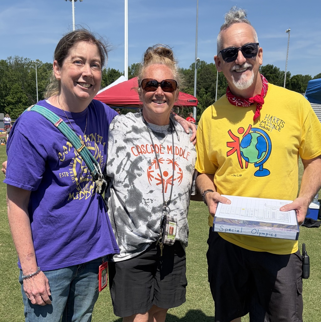 Three CDC teachers pose for a group picture.