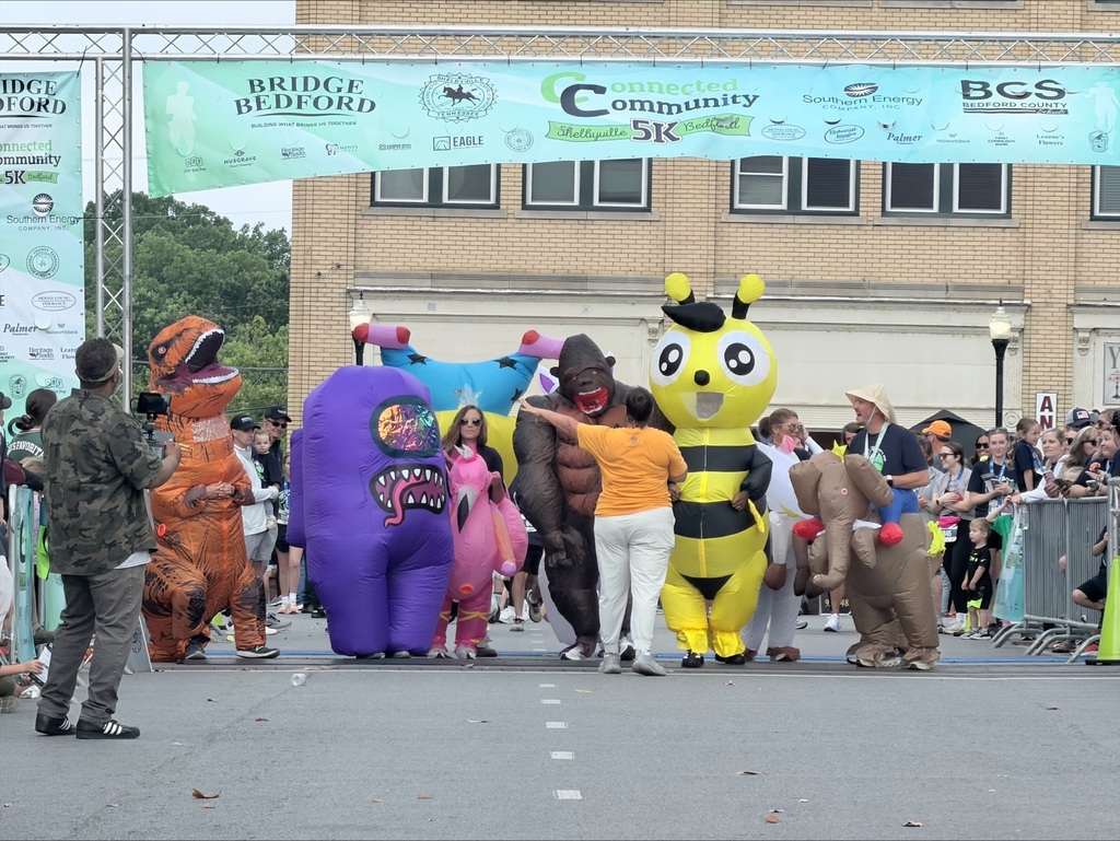 people in inflatable costumes
