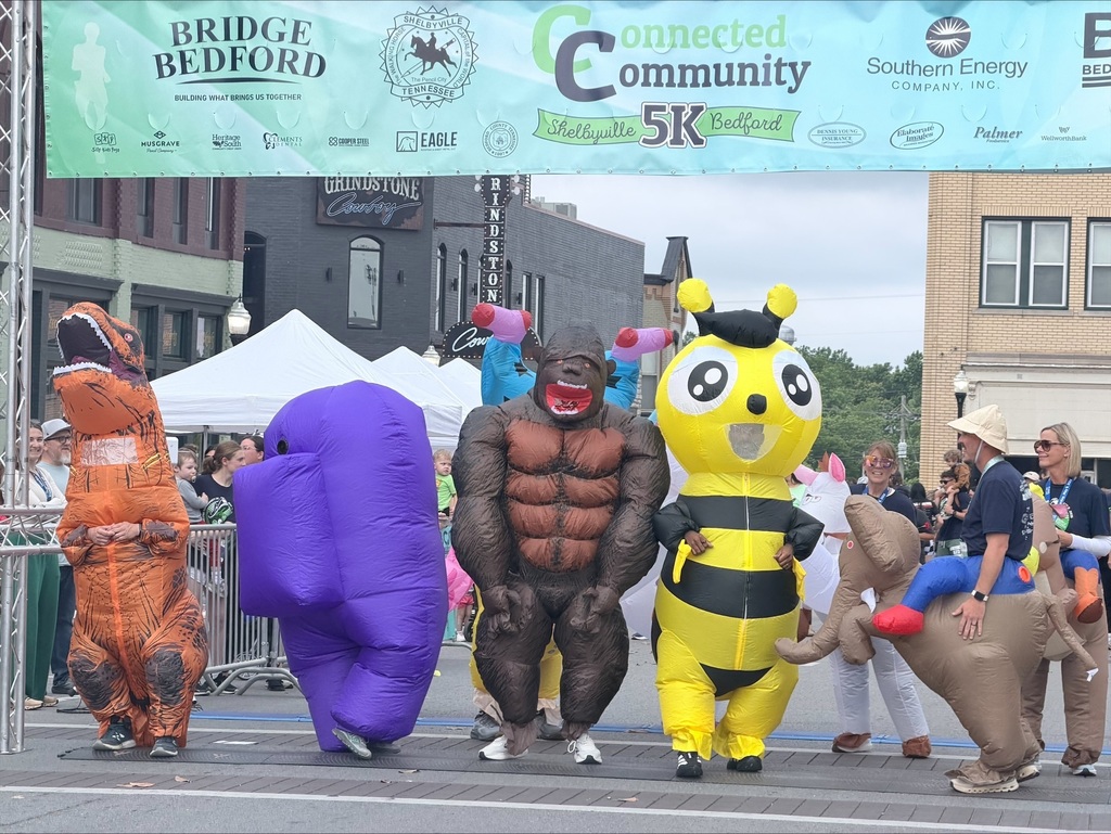 people in inflatable costumes