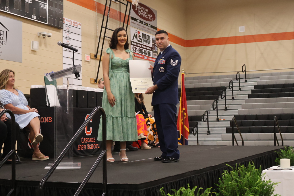A student receives a scholarship from a member of the United States military.