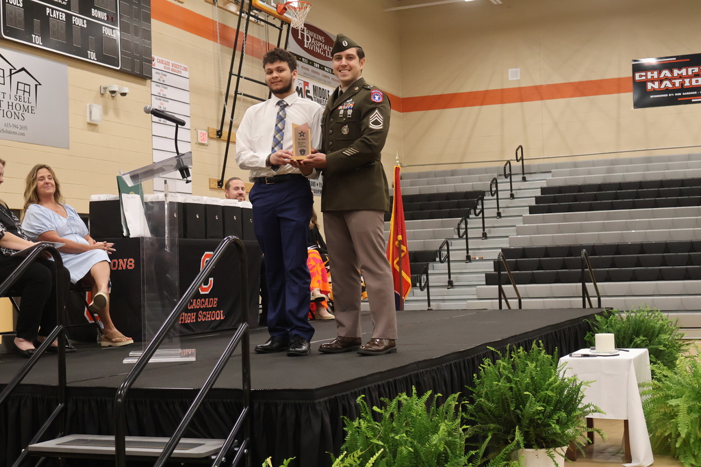A student receives a scholarship from a member of the United States military.