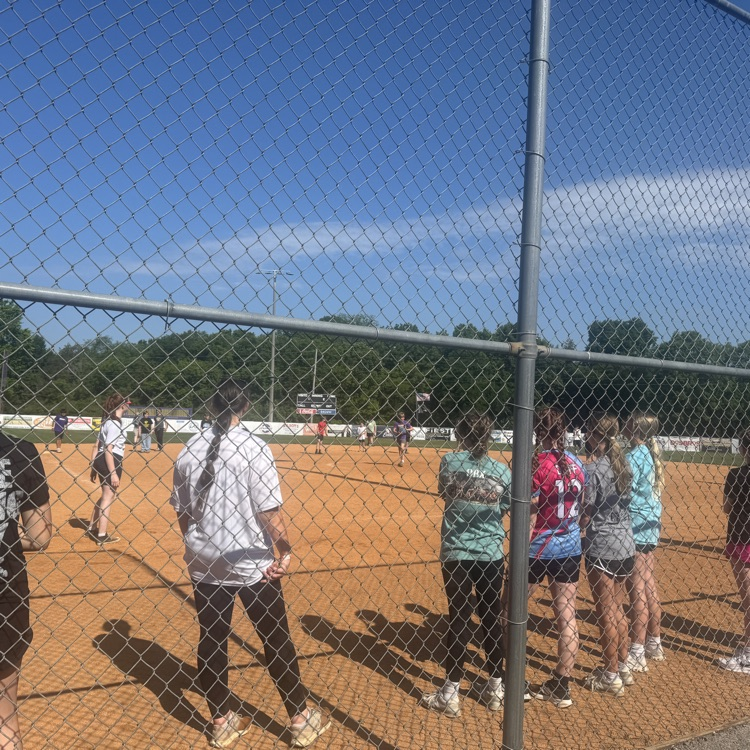 kids playing kickball