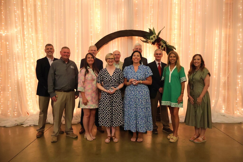 A group photo of those who received award along with the school board members, superintendent and assistant superintendent. 