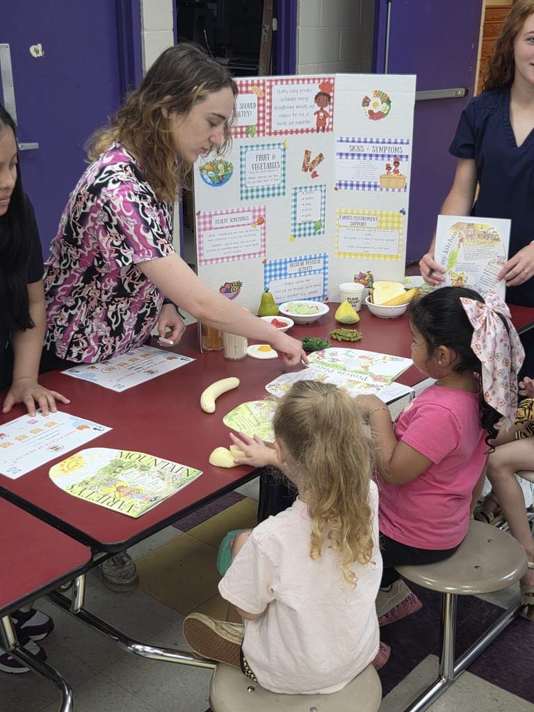 Pre-K students are learning about healthy eating from high schools students.