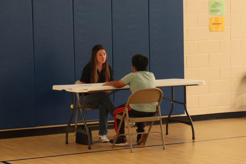 A student is participating in a role in the Amazing Shake competition. 