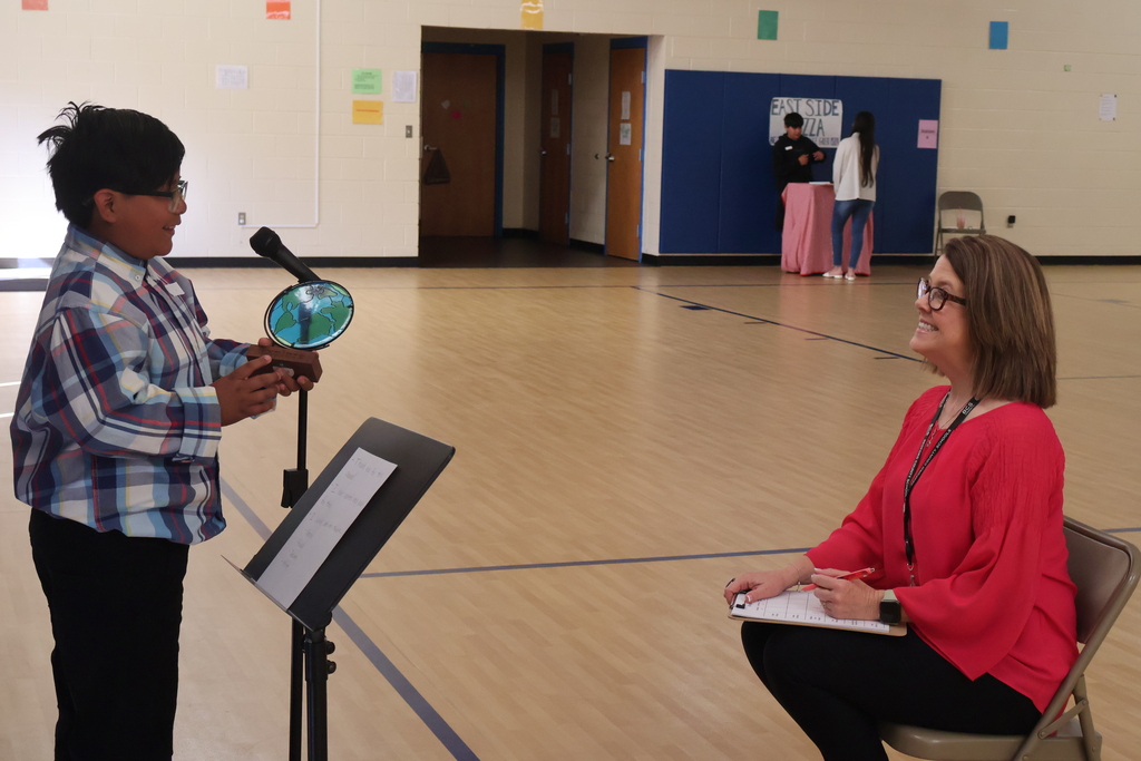 A student is participating in a role in the Amazing Shake competition. 
