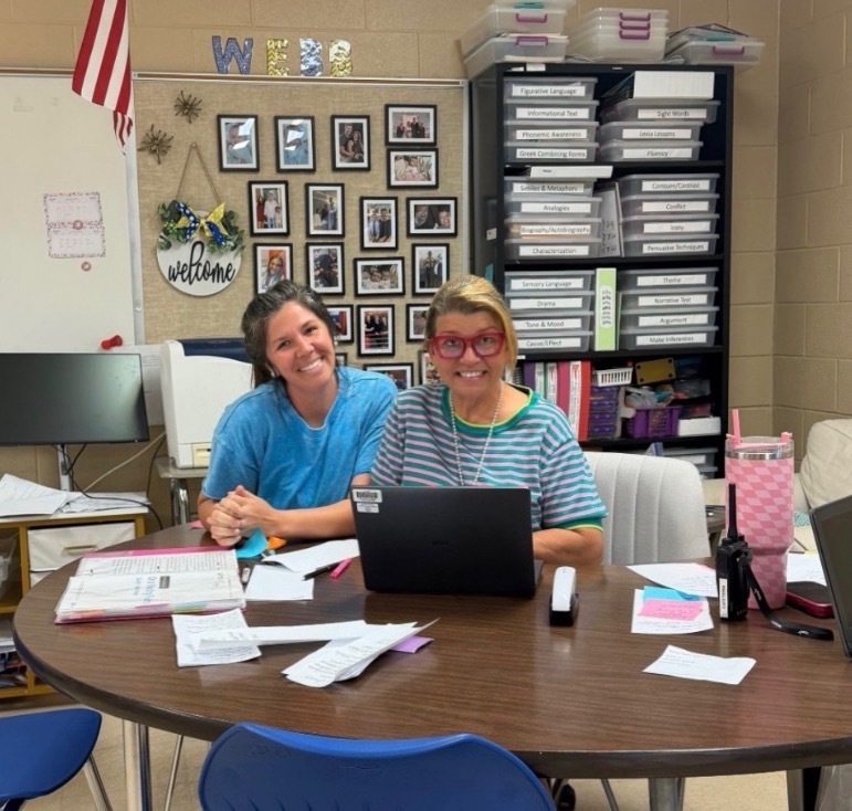Two interventionists at Harris Middle School pose for a picture 