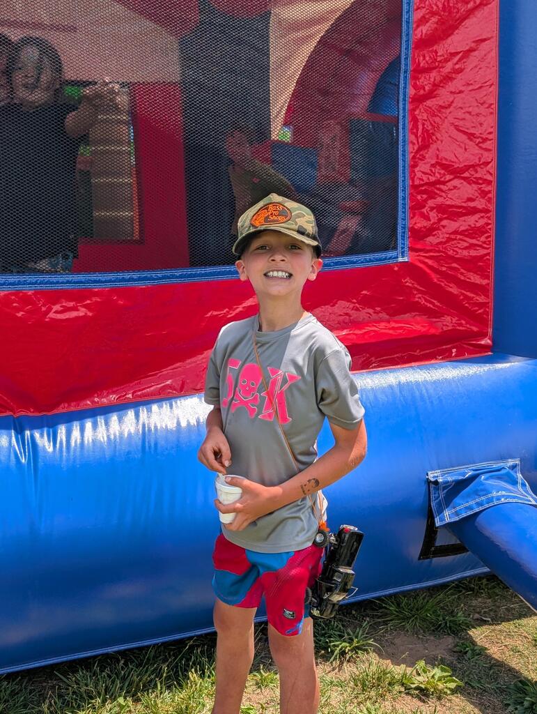 Field Day pictures of students playing and enjoying the beautiful day