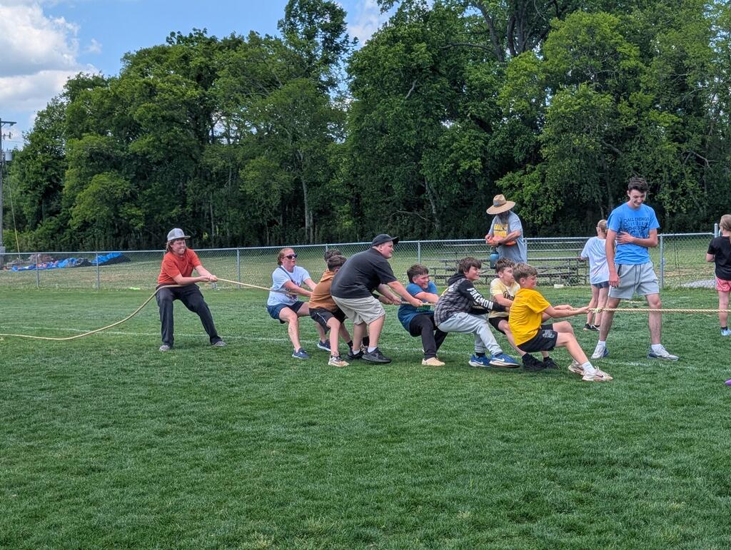 Field Day pictures of students playing and enjoying the beautiful day