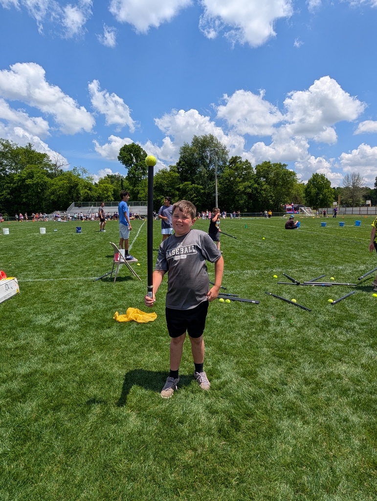 Field Day pictures of students playing and enjoying the beautiful day