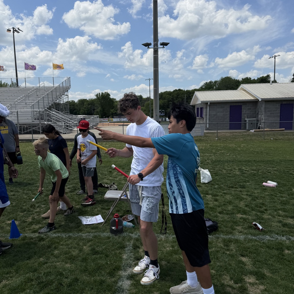 Field Day pictures of students playing and enjoying the beautiful day
