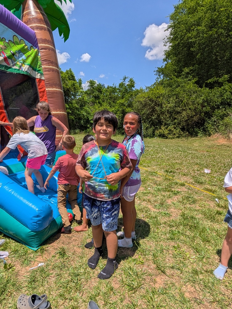 Field Day pictures of students playing and enjoying the beautiful day