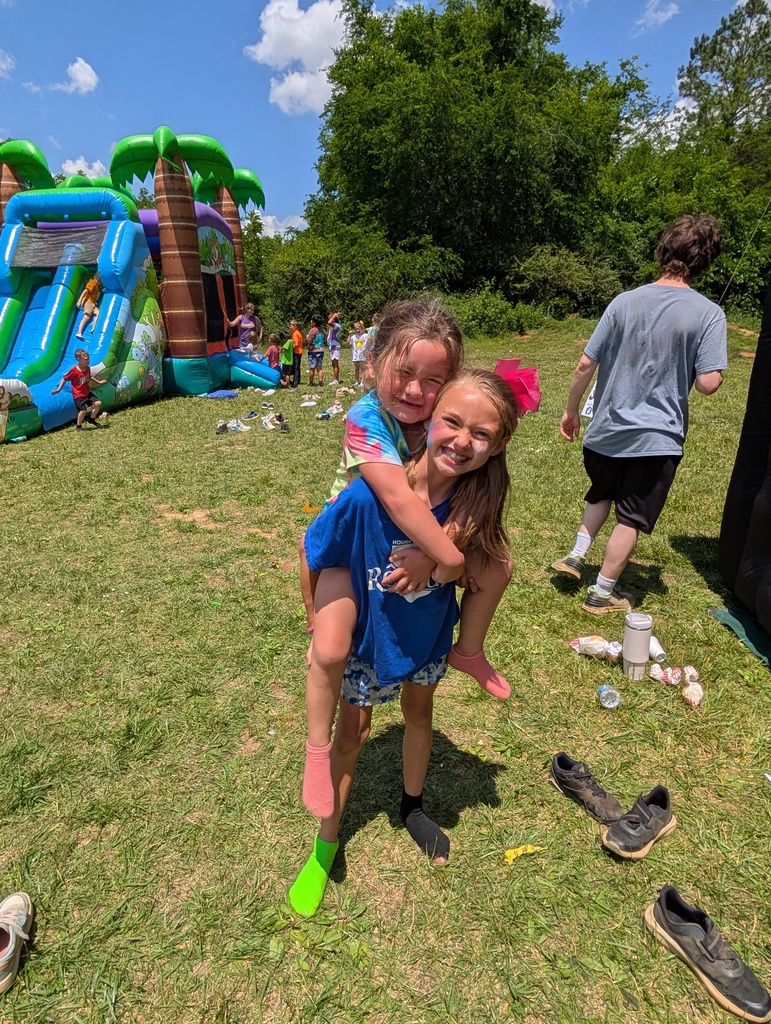 Field Day pictures of students playing and enjoying the beautiful day