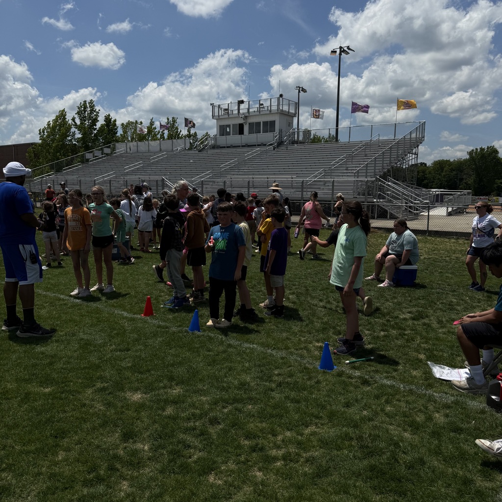Field Day pictures of students playing and enjoying the beautiful day