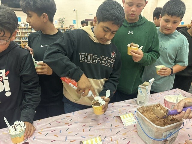 boys making an ice cream sundae