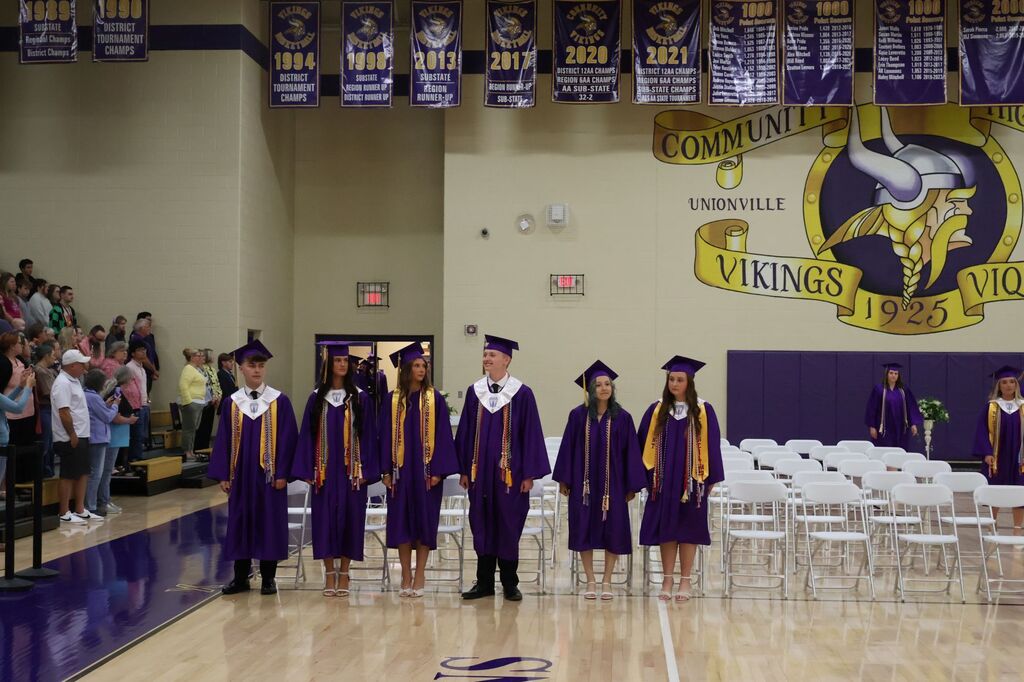 Students are waiting to be seated during honor's day.