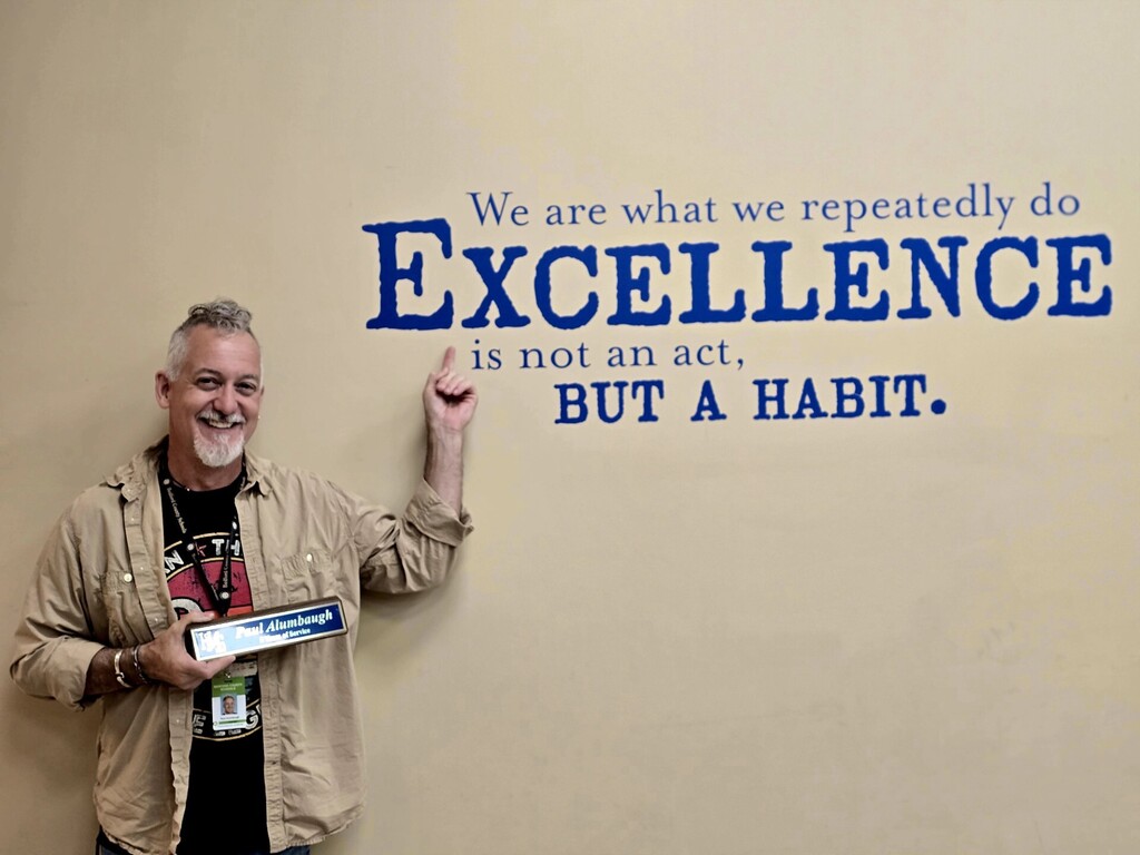 Mr. Paul getting his award for being a teacher at HMS for 5 years