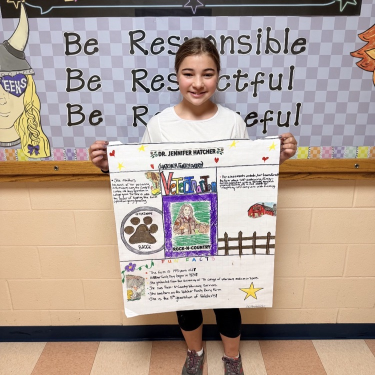 student with poster