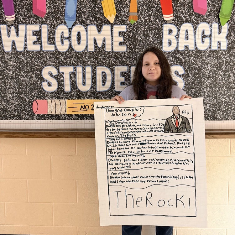student with poster
