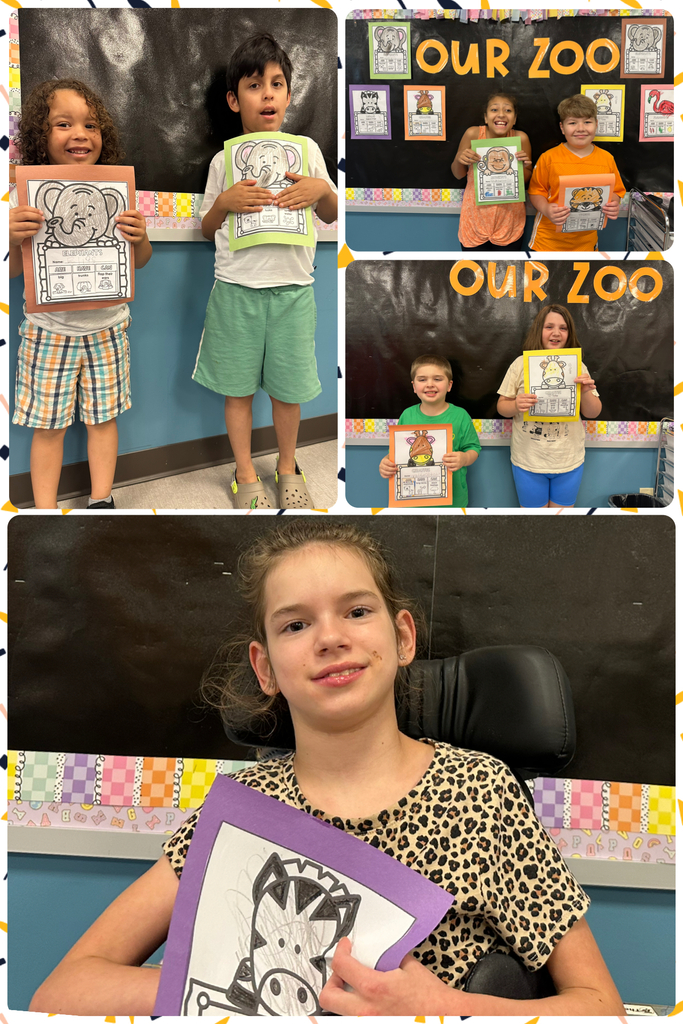 Students are holding a piece of construction paper that has zoo animals on it that they colored. 