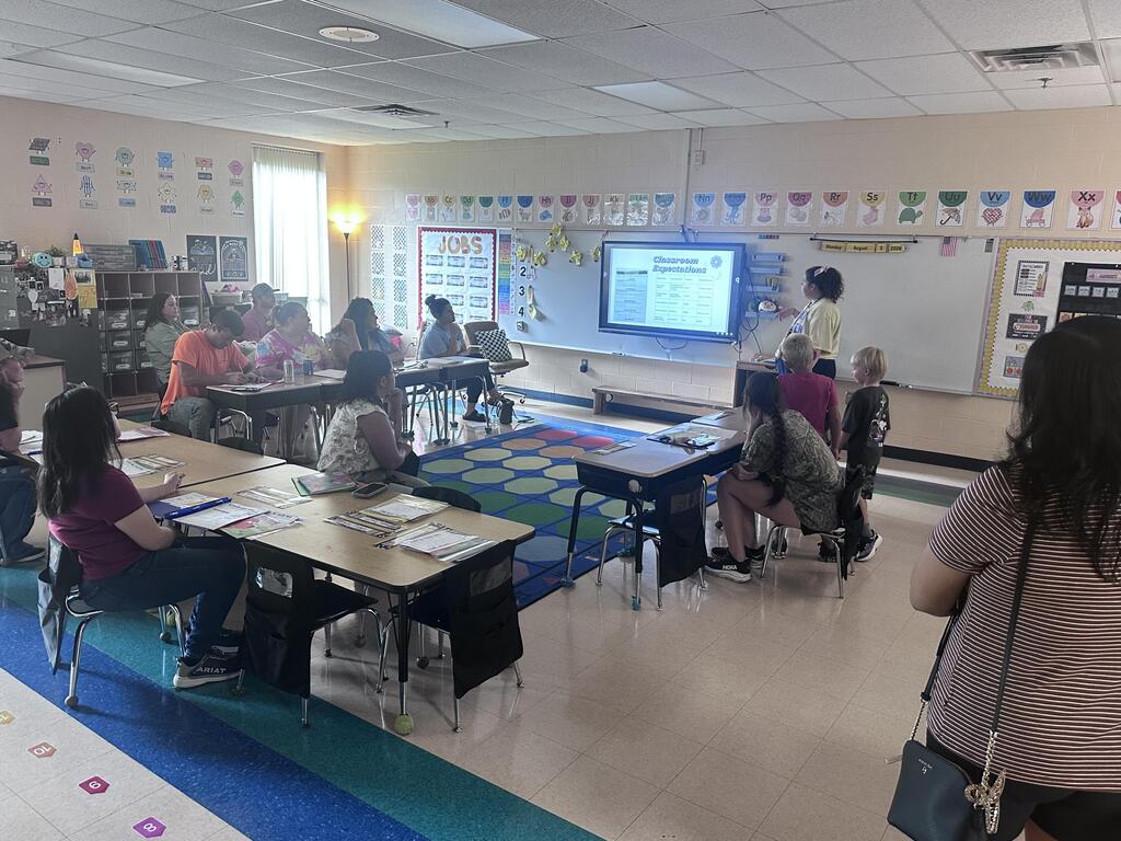 Parents attending Kindergarten parent meetings