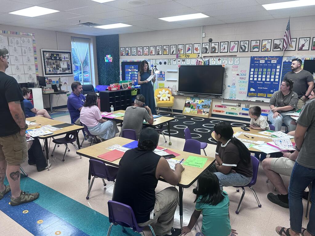 Parents attending Kindergarten parent meetings
