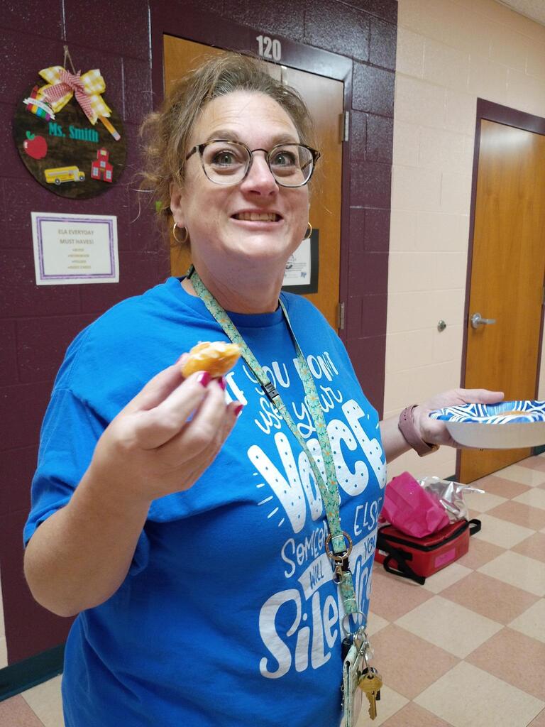 woman smiling with food