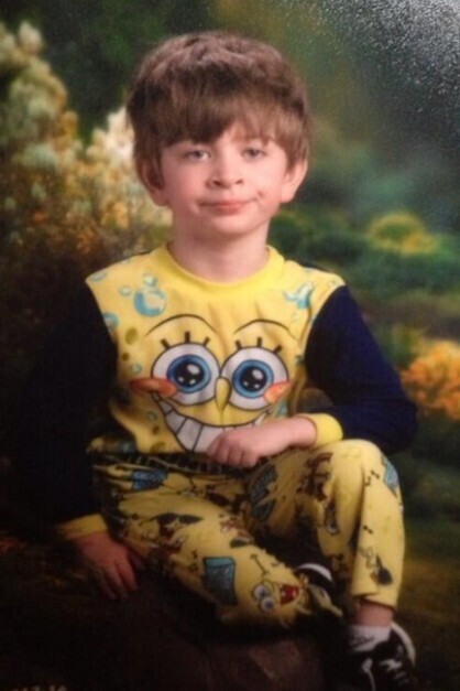 Child wearing pajamas in yearbook photo