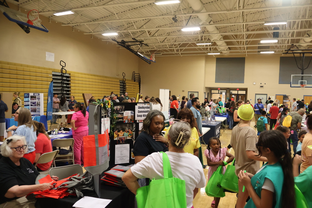 This is a photo of the gym and many of the community partners and all of the people who were there attending the event. 