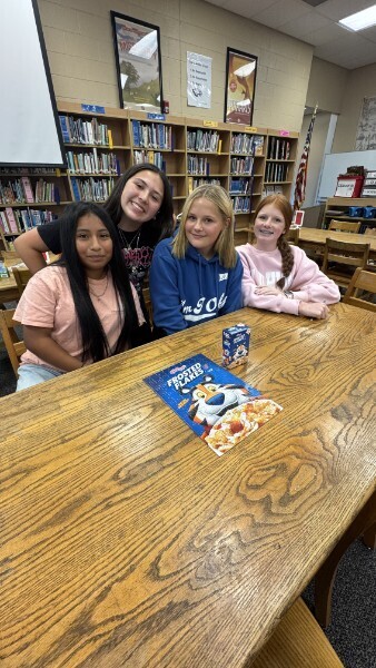 Students working puzzle to show that every piece matters