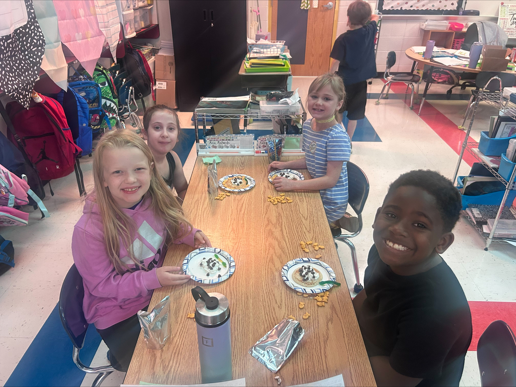 3 girls and 1 boy eating
