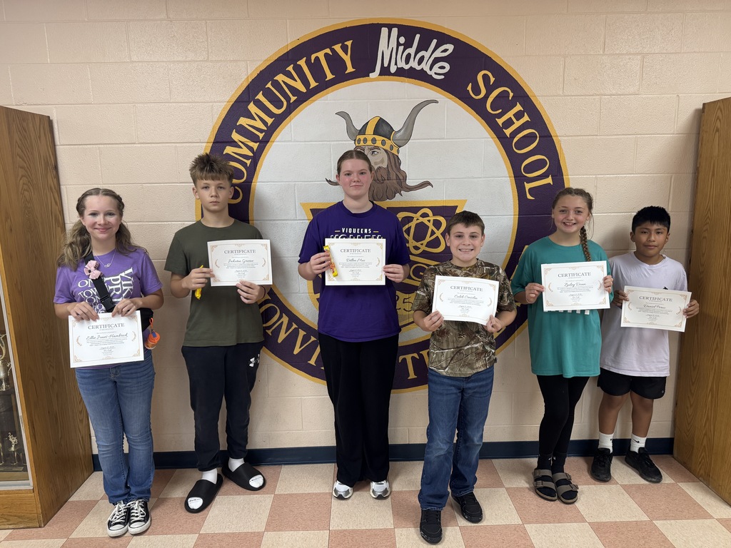 kids smiling with certificates