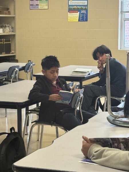 A student pauses to read
