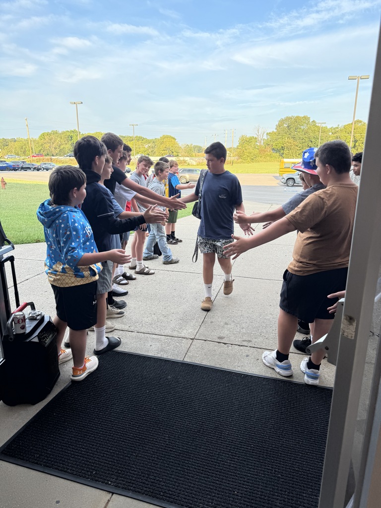 boys giving high fives