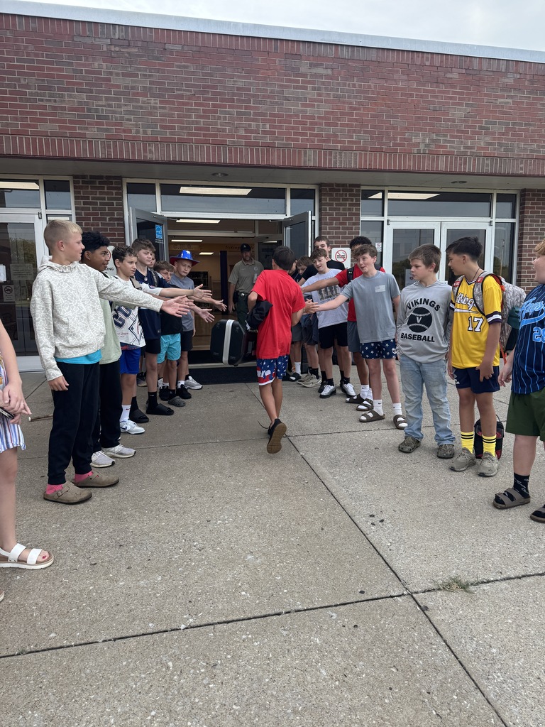 boys giving high fives