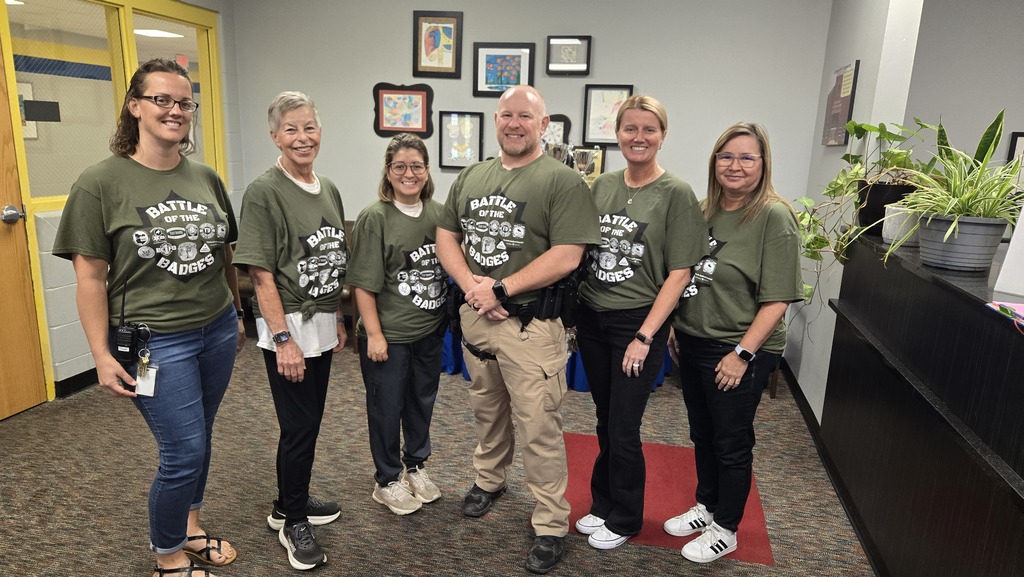 6 office staff standing for picture