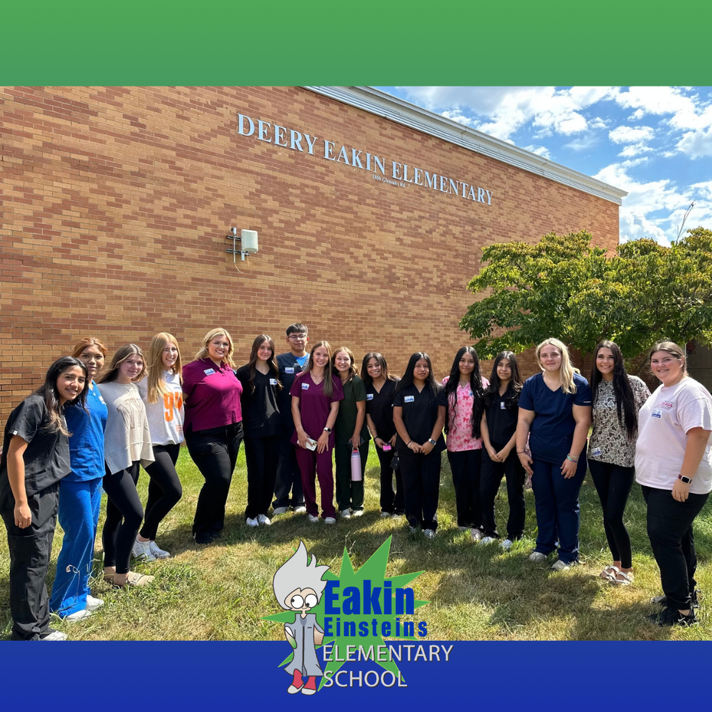 All of the HOSA students are posed for a group picture outside of Eakin Elementary School.