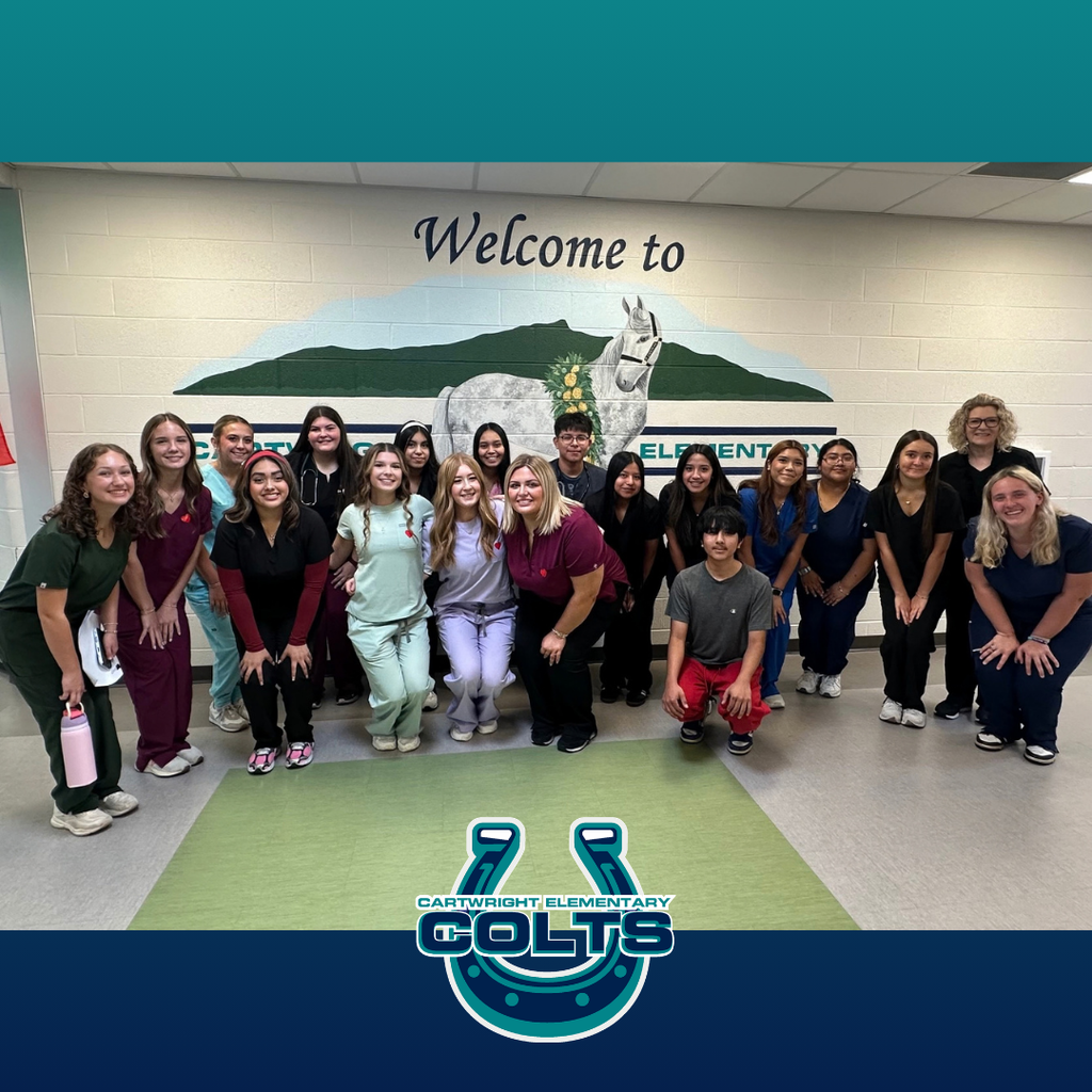 All of the HOSA students are posed for a group picture outside of Cartwright Elementary School.