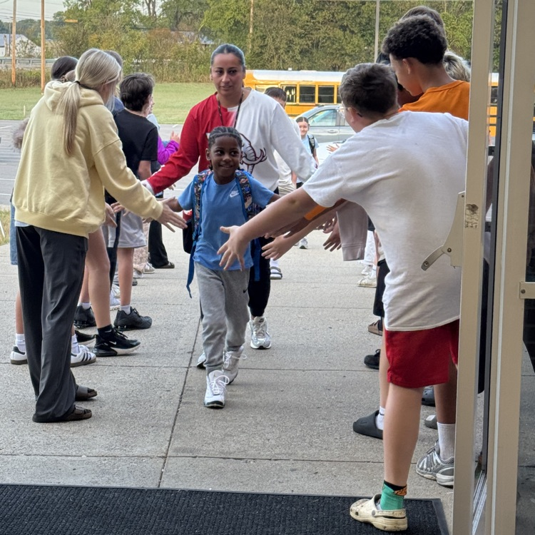 kids giving high fives