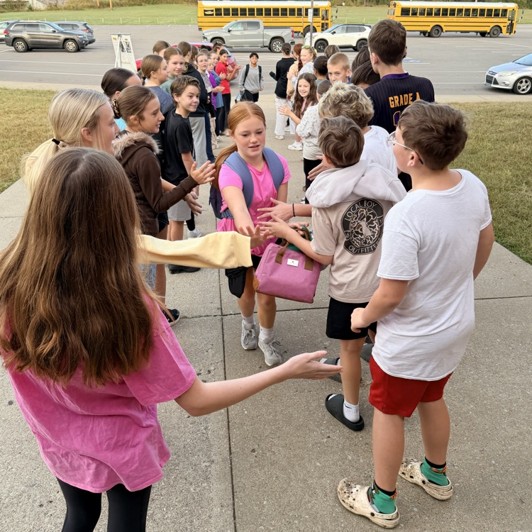 kids giving high fives