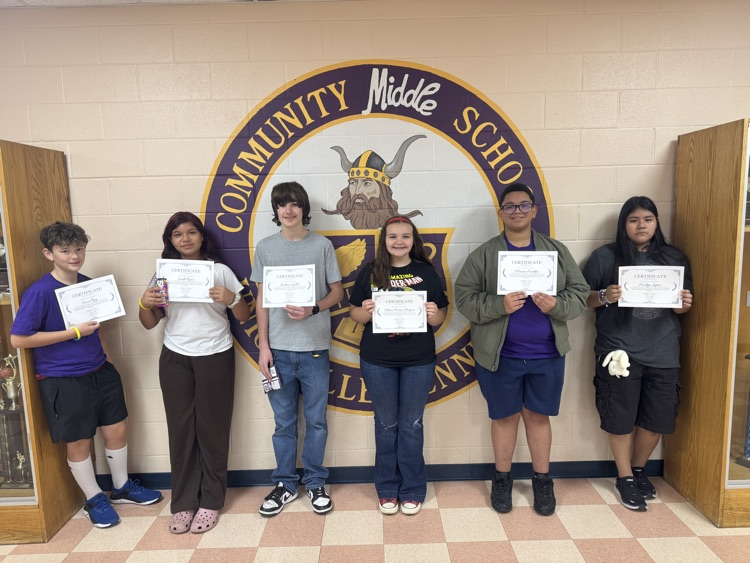 kids smiling with certificates
