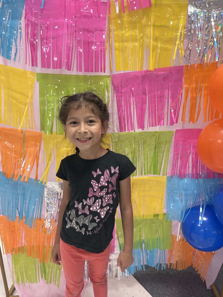 students with a colorful backdrop
