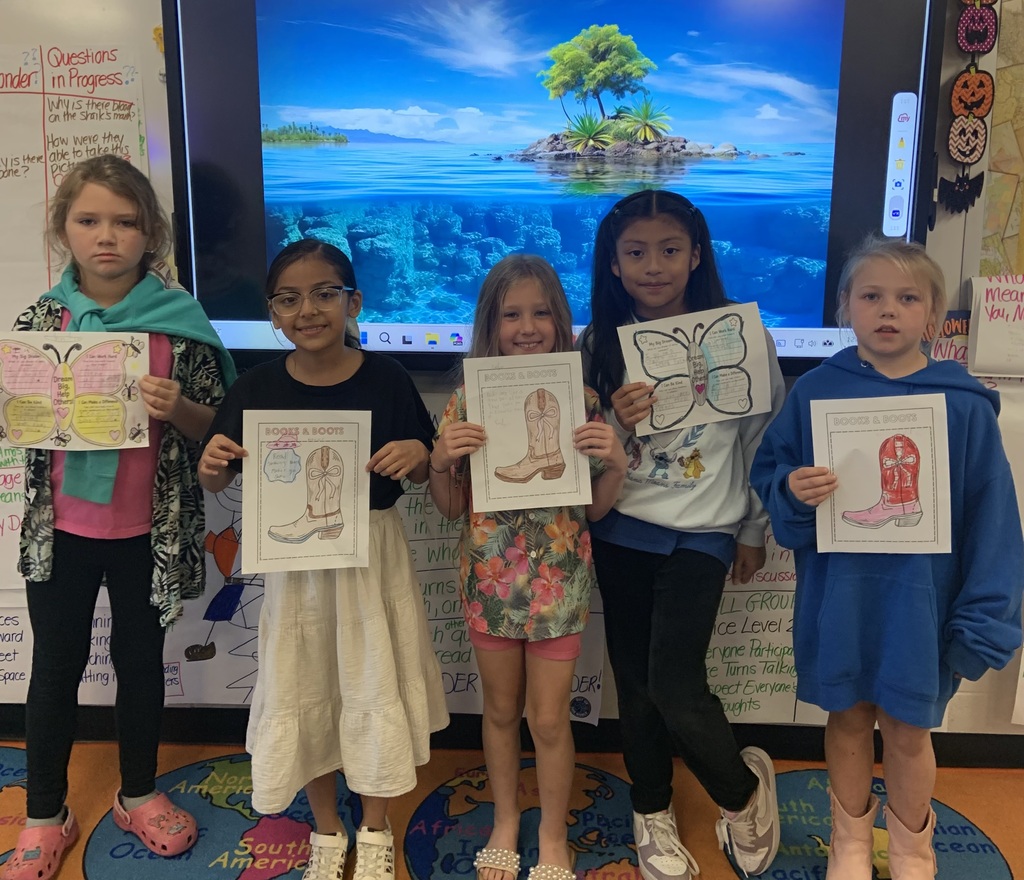 Beach day photo of students with colored pictures