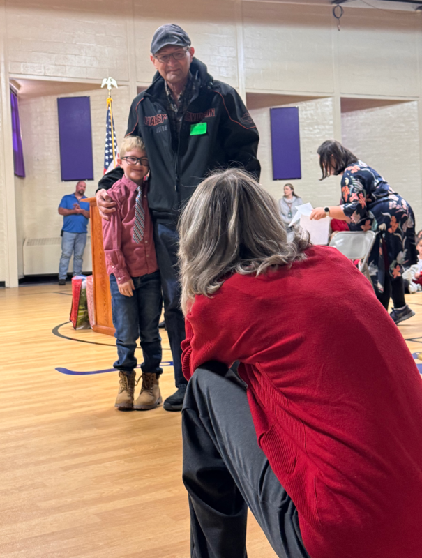 student/veteran taking picture