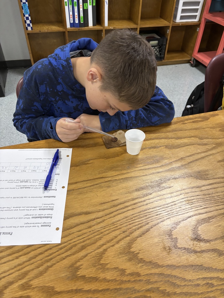 Mrs. Allgood's class did a Penny Lab to determine which side of the penny would hold more water.