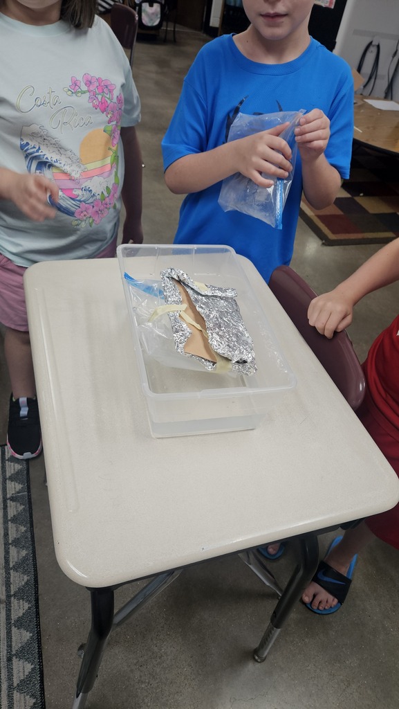 Students building boats