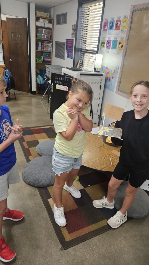 Students building boats