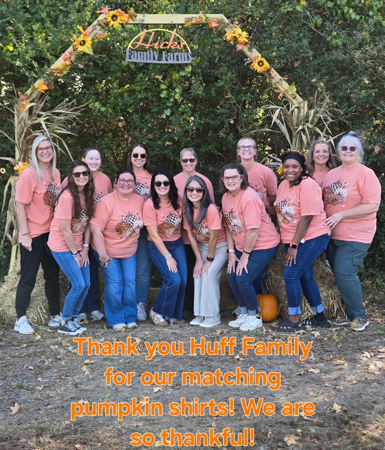 Pre-K staff in matching pumpkin shirts donated by the Huff family  