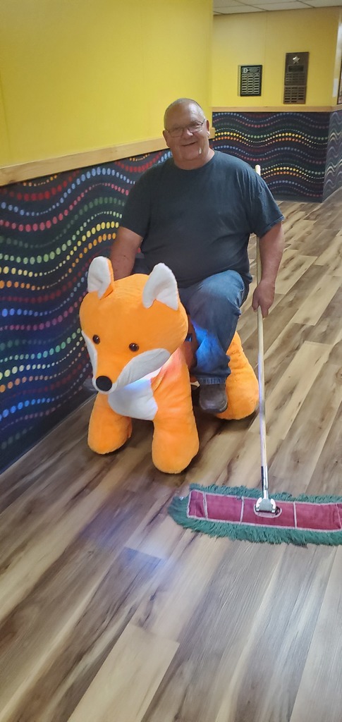 Mr. Pickle and fox ride on 